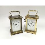 Two antique brass cased carriage clocks.