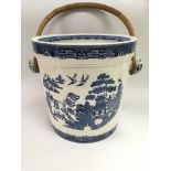 A blue and white Wedgwood slop jar and lid in Old