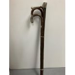 Four old walking sticks with silver mounts