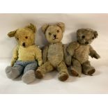 Three vintage teddy bears. 2 approximately 33cm tall and 1 approximately 30cm tall. No reserve.