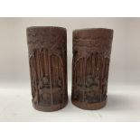 A 20thC carved bamboo brush pots.