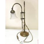 A converted brass table lamp.