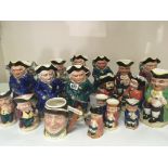 A collection of Toby and other caricature jugs. (a