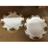 Six Royal Albert Country Roses dinner plates and a