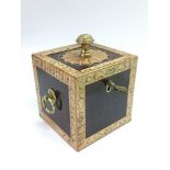 An inlaid mahogany tea caddy with gilt metal mount