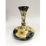 A Moorcroft vase from the Sir Harold Hillier Gardens Collection by Rachel Bishop in yellow shrine