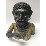 A cast iron American money box Dinah .aq