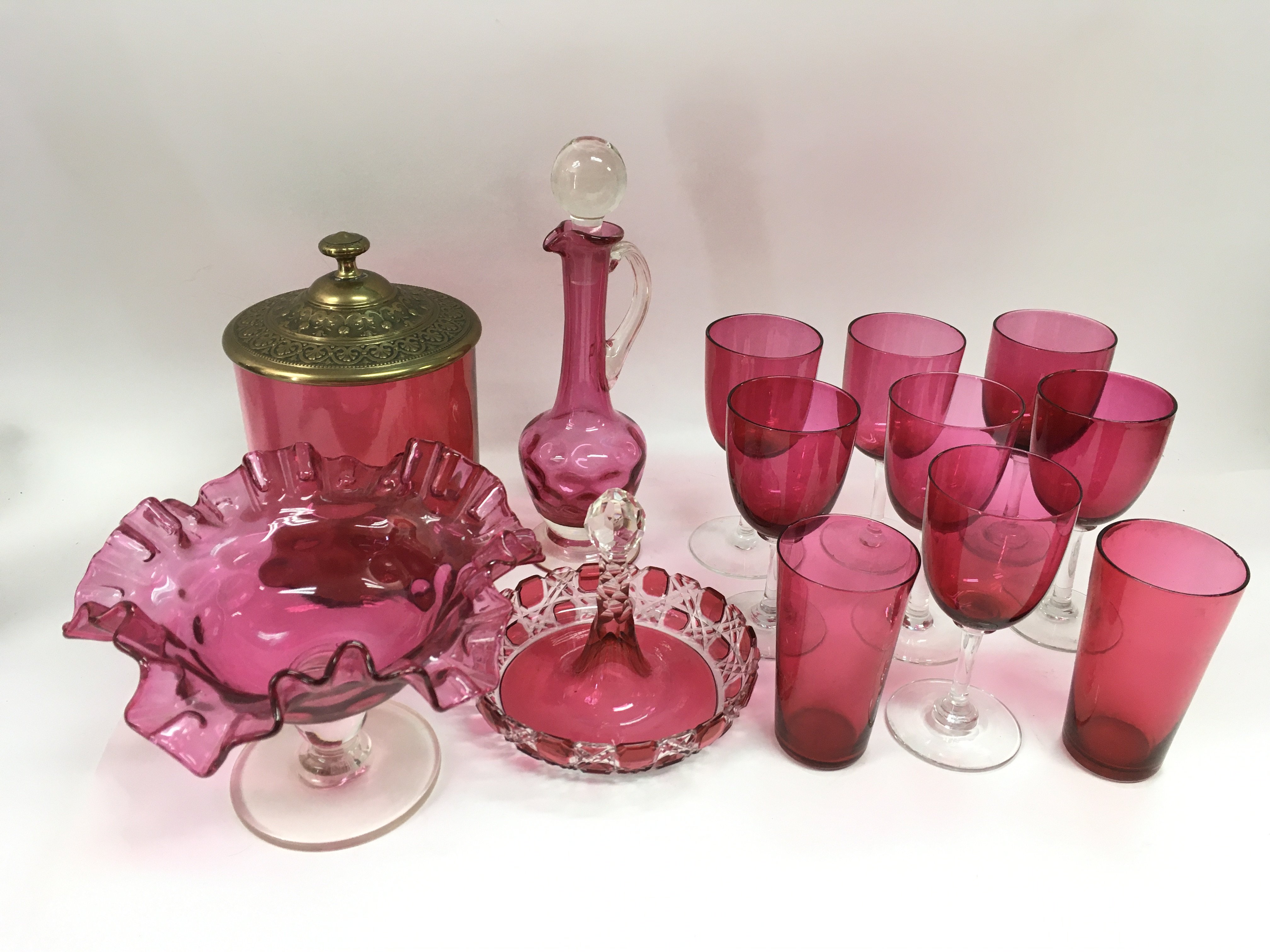 A collection of Victorian and later cranberry glas