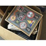 A box containing a collection of military related