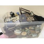 A box containing lighters tins oak regimental tins