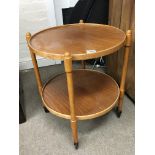 A modern design teak circular tea trolley or occas