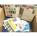 A Box Containing Stamps and First Day Covers.