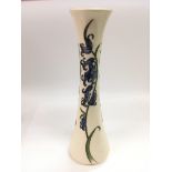 A Moorcroft vase of waisted form and in Bluebell Harmony pattern, approx height 31cm.