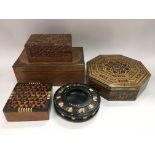 A collection of boxes including an octagonal parqu