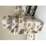 A collection of boxed Lilliput Lane cottages in a