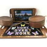 Two butterfly wing trays and two graduated leather