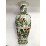 A large famille verte vase depicting courtly figur