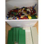 A box of loose vintage Lego.