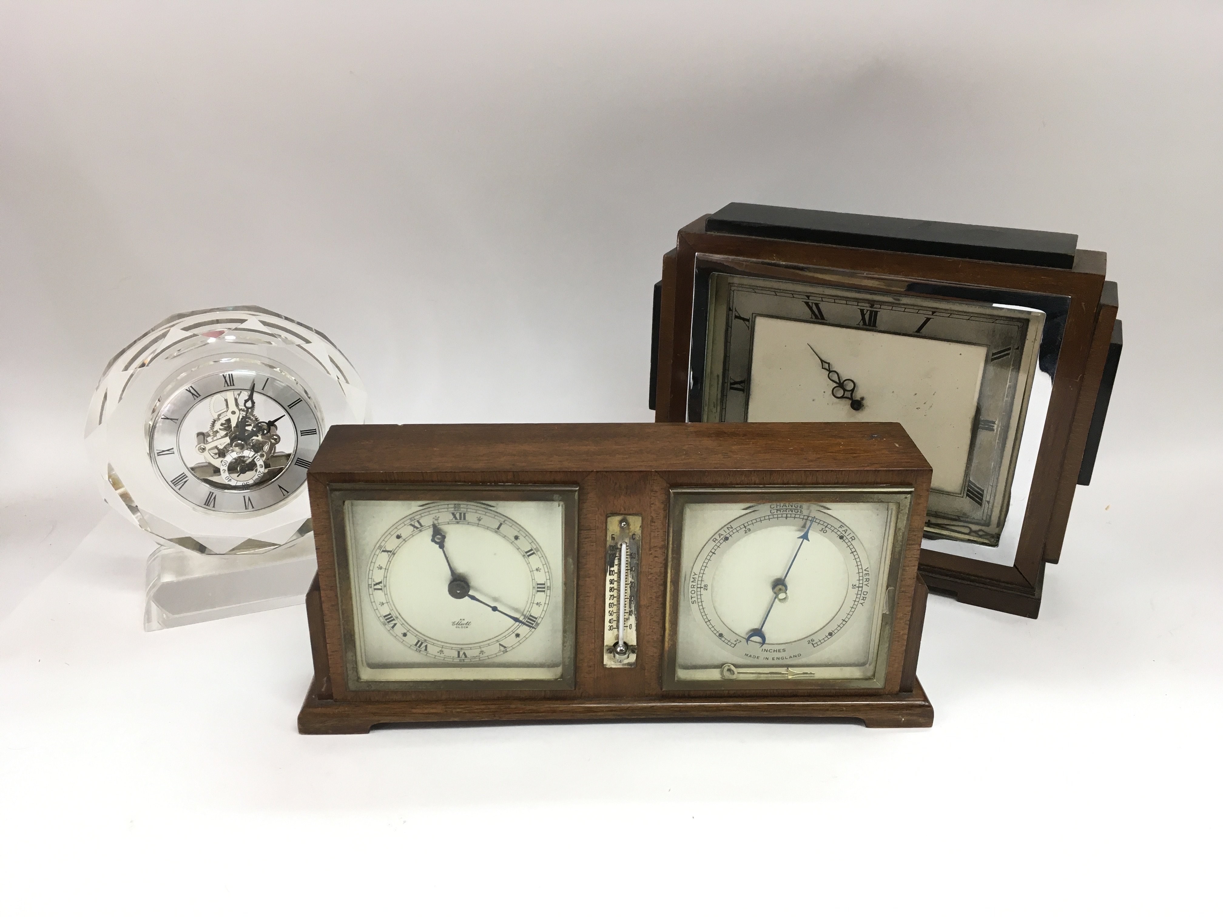 An Art Deco clock and barometer, glass mantle cloc