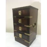 A small flight of mahogany drawers of campaign des