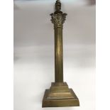 A large brass Corinthian column table lamp, approx