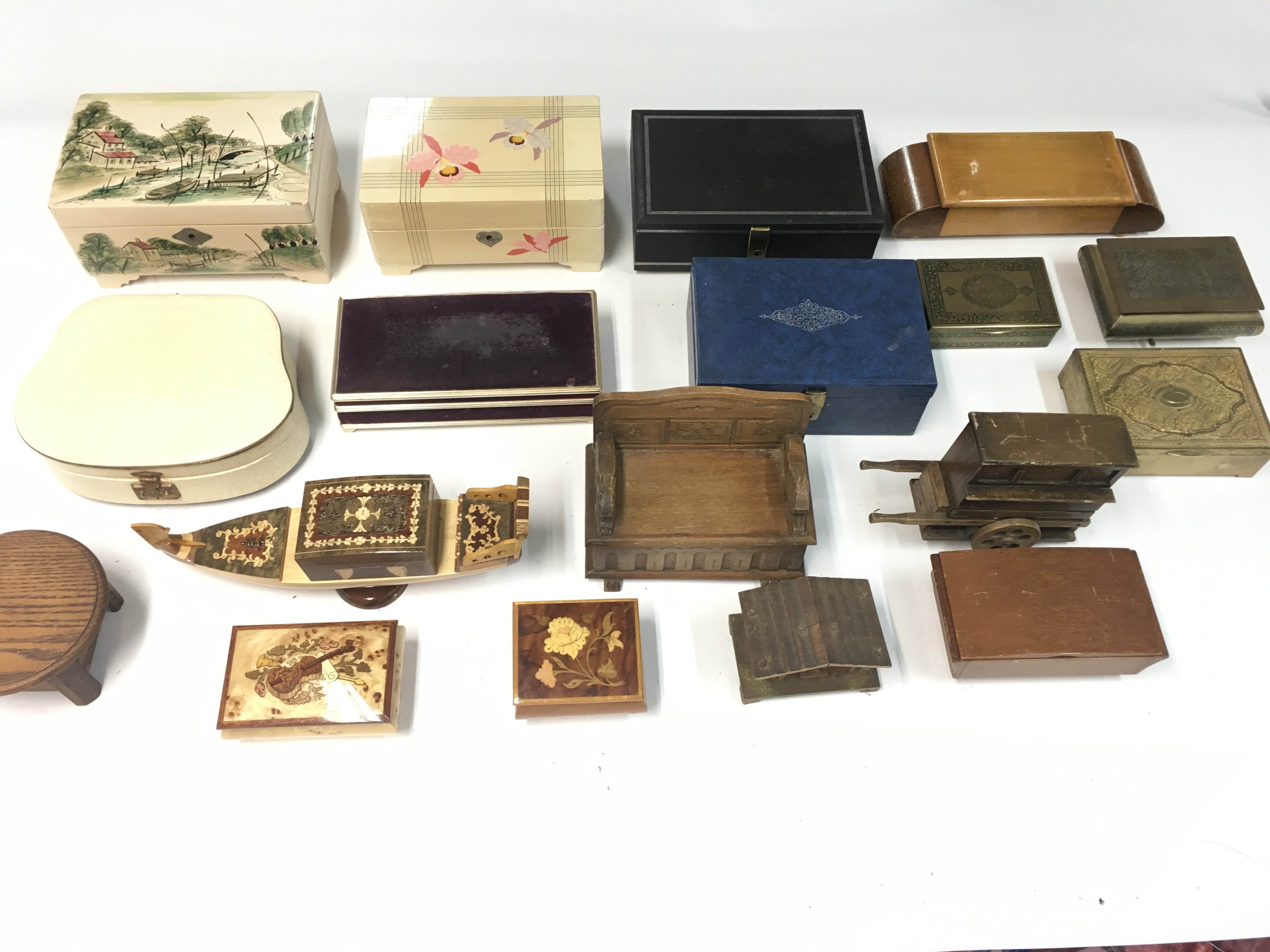 A collection of various music boxes and trinket bo