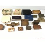 A collection of various music boxes and trinket bo