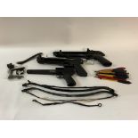 Three crossbows, partly dismantled including bolts and arrows. No reserve.