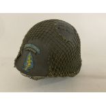 An American issue helmet painted with special forc