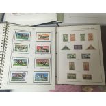 A collection of stamp albums including America Sou