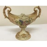 A Royal Worcester porcelain chase with raised gilded scroll handles and raised embellishments hand