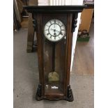 A mahogany cased wall clock with white enamel dial