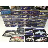 26 boxed model of British police cars.