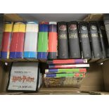 A box of Harry Potter books and books on tape.