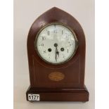 An Edwardian inlaid arch topped mantle clock, 31cm