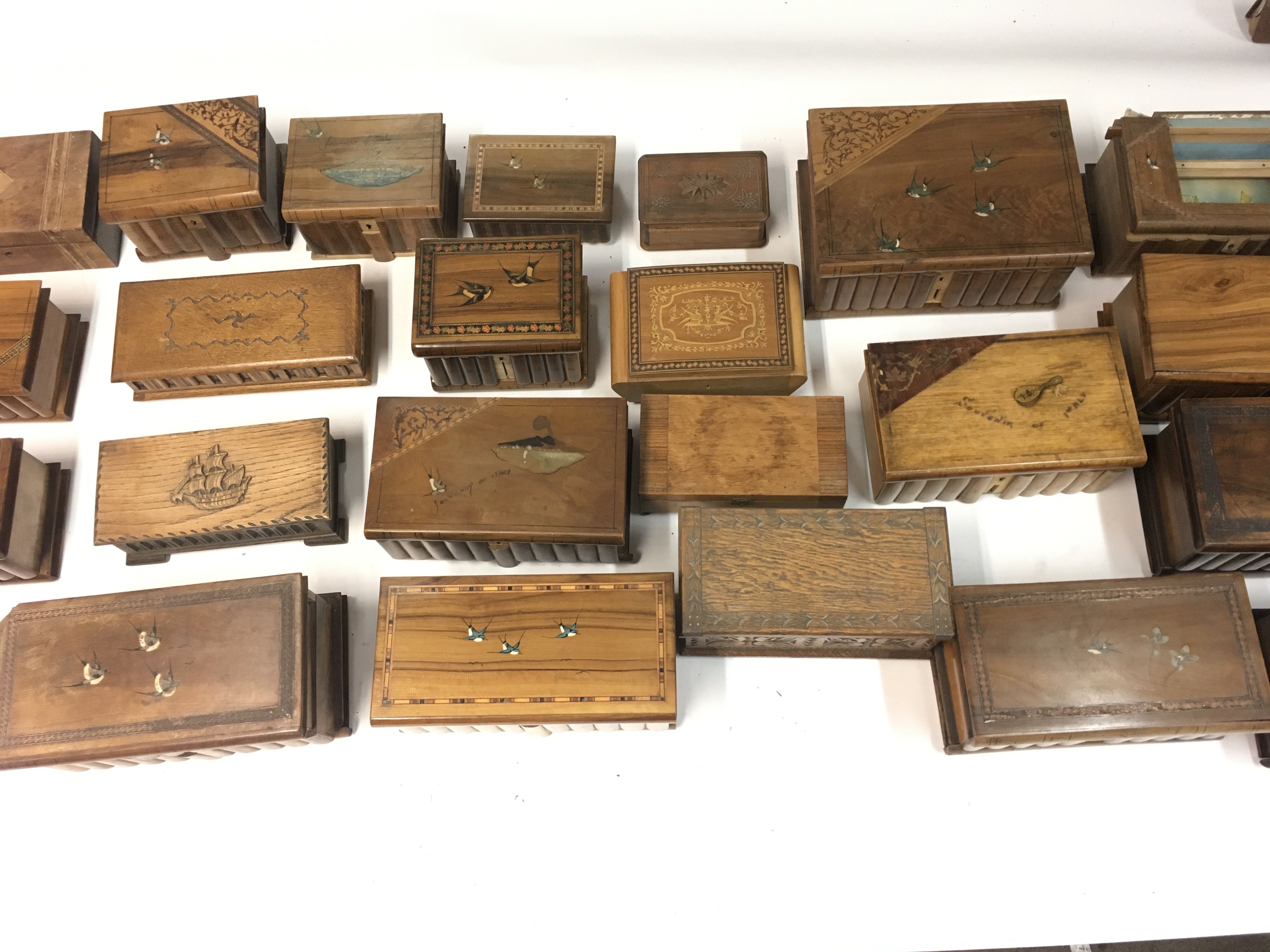 A collection of various music boxes and trinket bo