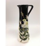 A limited edition Moorcroft Mermaid Rose jug, number 13/30, approx height 24cm.