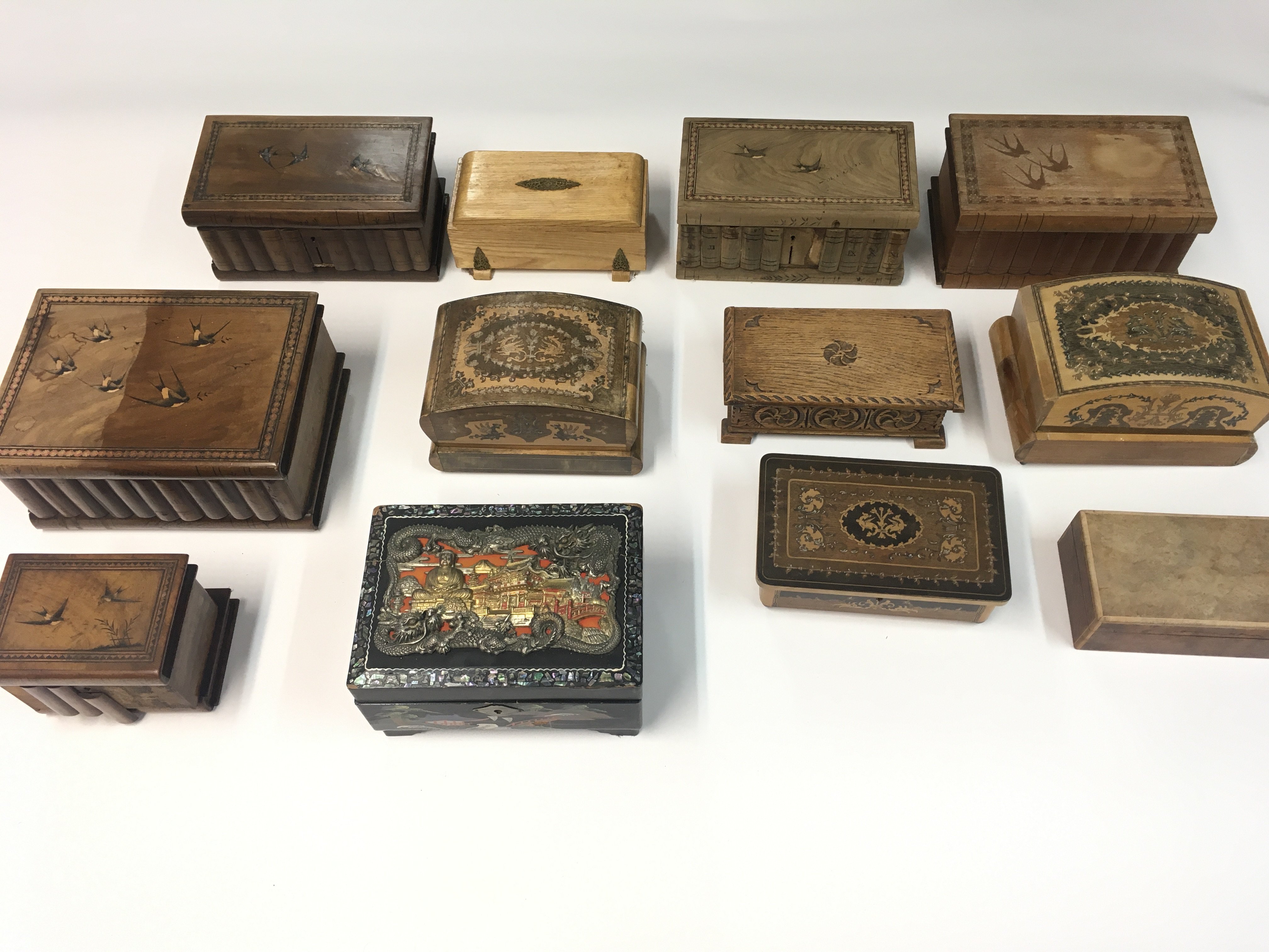 A collection of various music boxes.