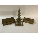 A brass Pagoda, approximately 22cm tall, with Chinese symbols cast into base. With antique Chinese