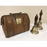 A small leather Gladstone type bag and two brass h