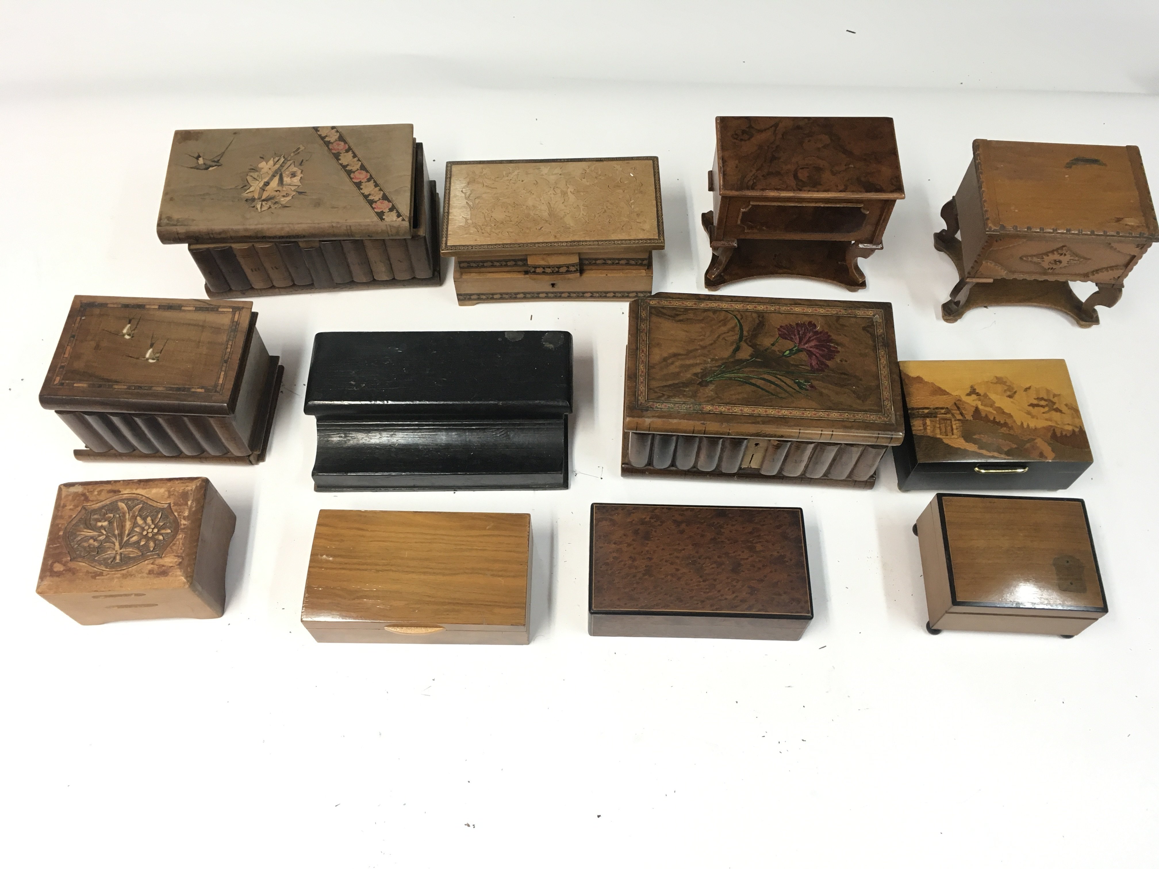 A collection of various music boxes and trinket bo