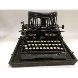 A vintage cased Salter No7 typewriter.