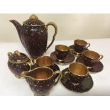 A Carlton Ware Rouge Royale coffee set with five c