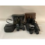 A collection of 4 pairs of Binoculars including Charles Frank 8x40 ( gold-coated optics ) , Kent