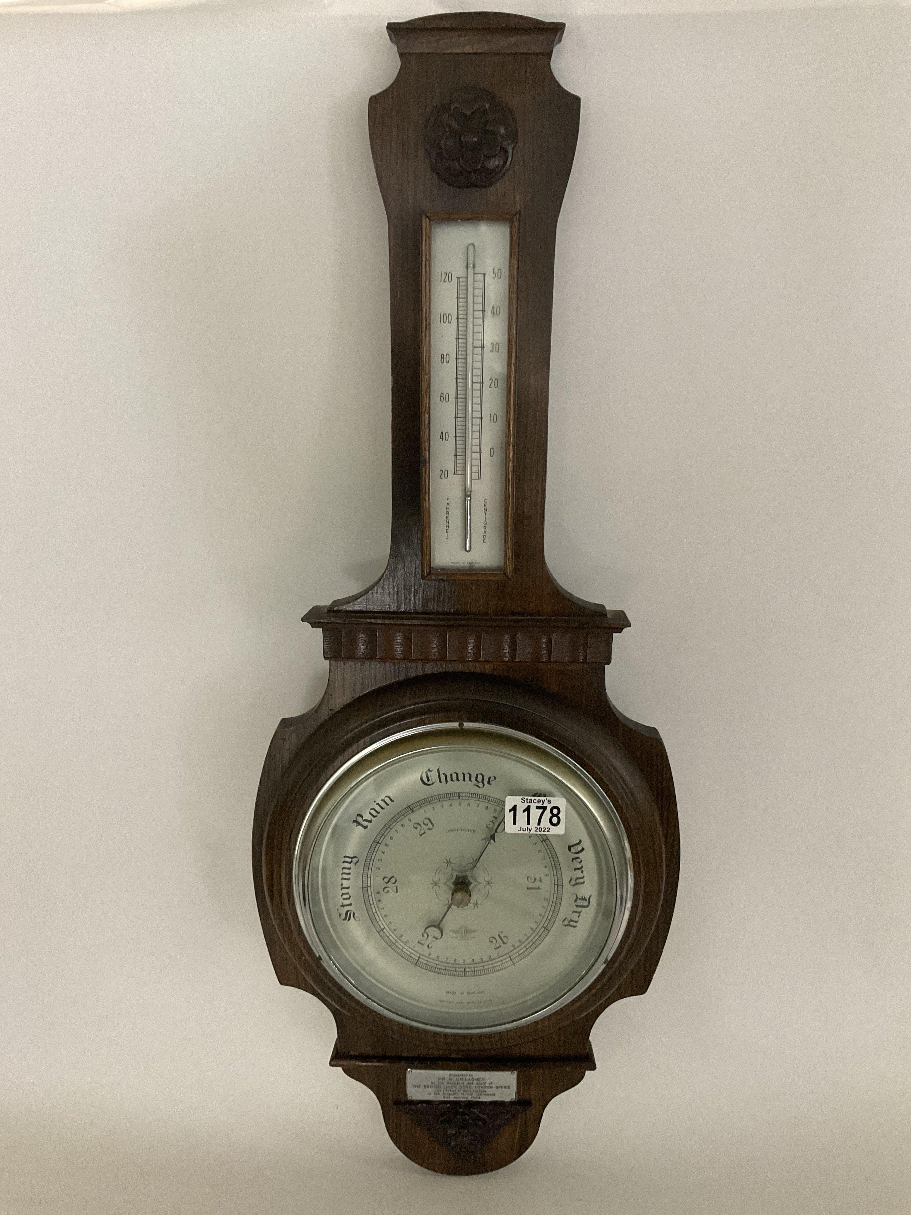 A 1930s smiths oak barometer. 76cm.