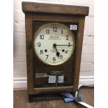 An oak cased National Time Recorder clock