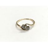 A 9ct gold three stone diamond ring, approx 1.7g a