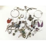 A collection of jewellery including silver earring