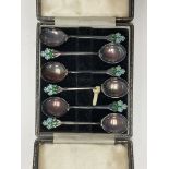 A cased set of 6 hallmarked silver and enamel spoo