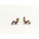 A pair of 18ct gold diamond and pink tourmaline ea